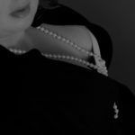 Entice Me Non-Toxic Sex Toys Image - sexy cleavage and pearls 