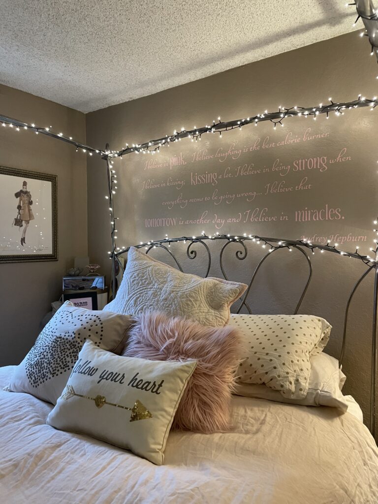 bed with fairy lights